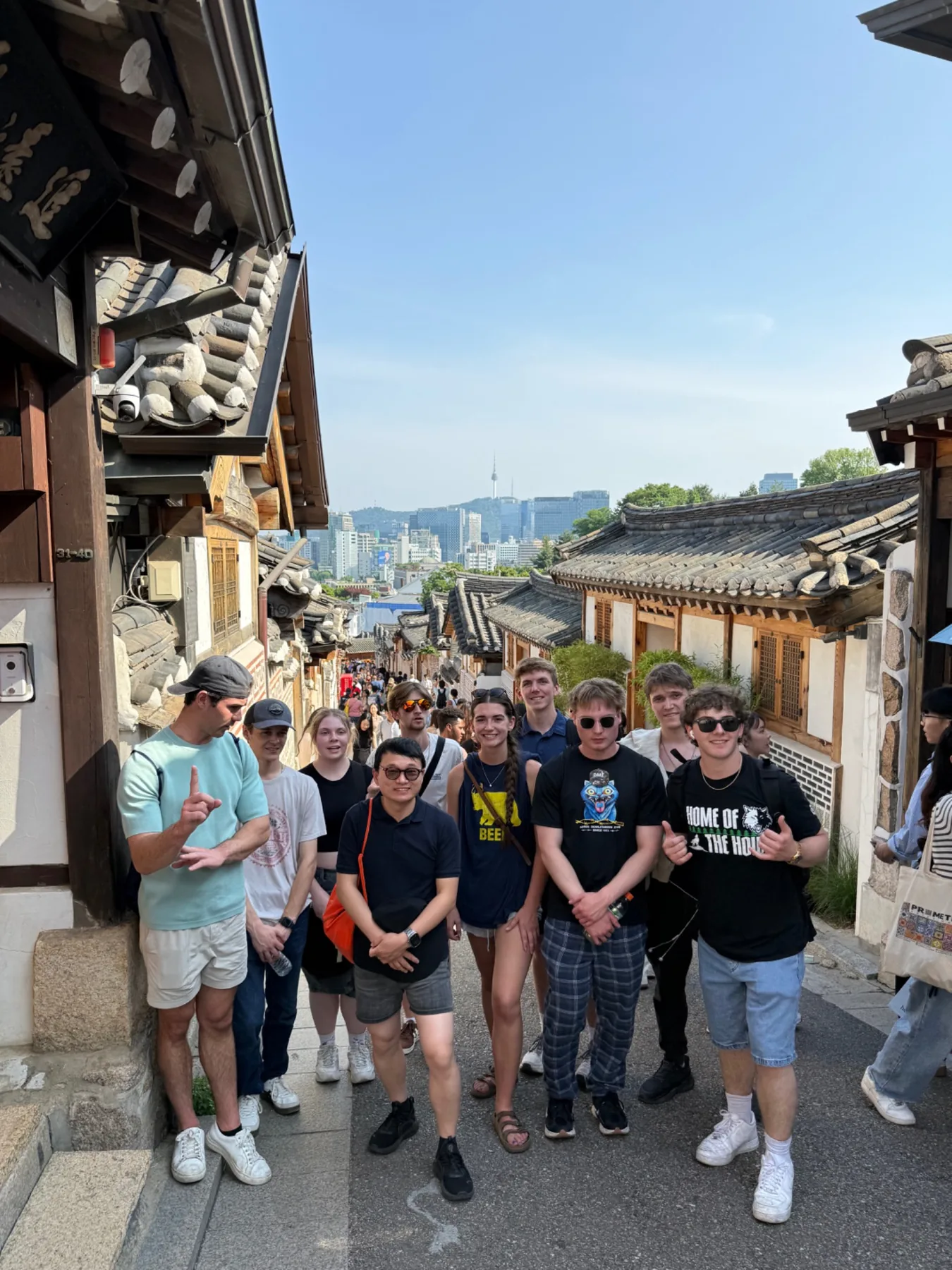 Students exploring Bukchon Hanok Village in Seoul